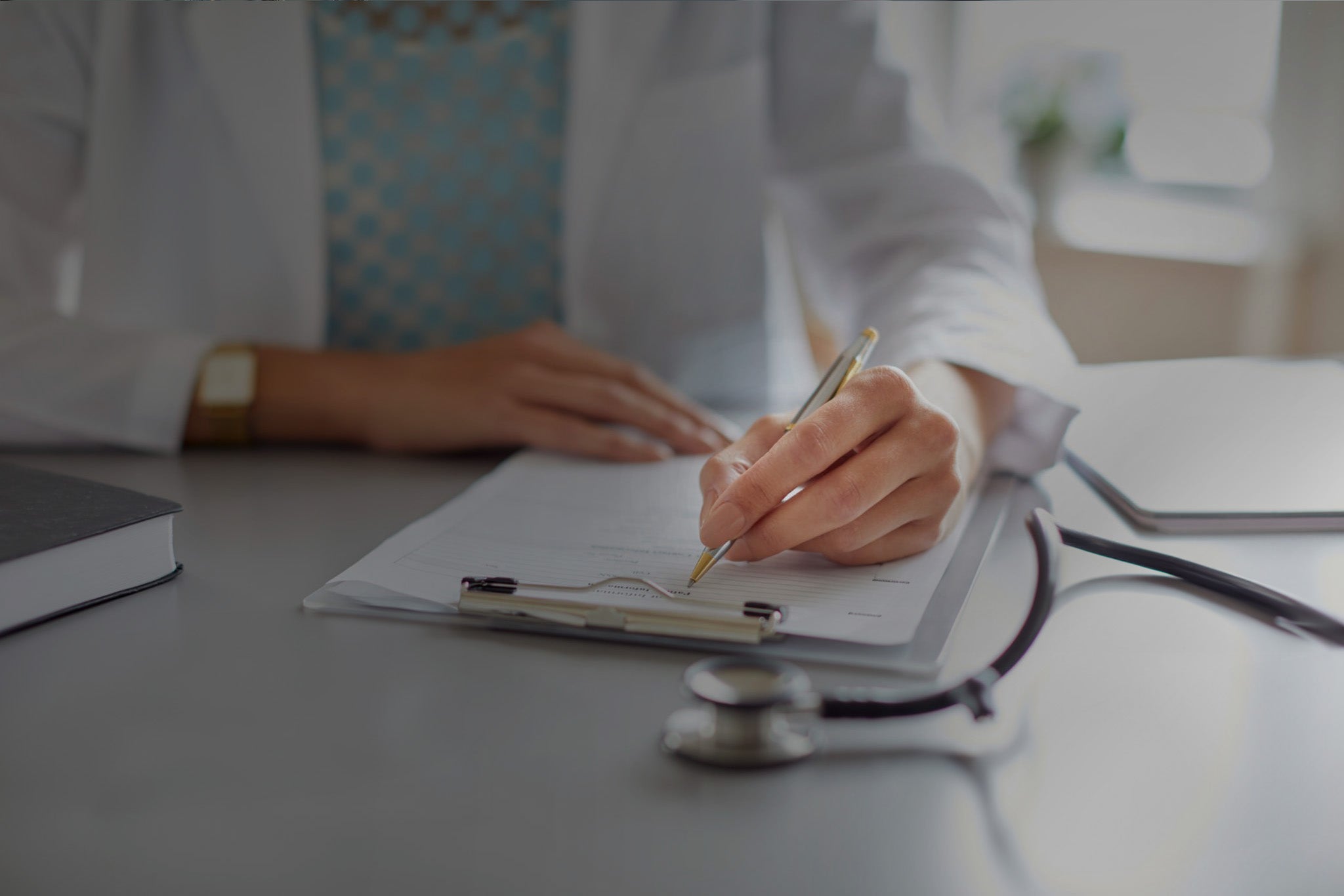 An EIP Qualified Personnel member conducting a facility assessment and completing a compliance checklist based on new CSA healthcare standards.