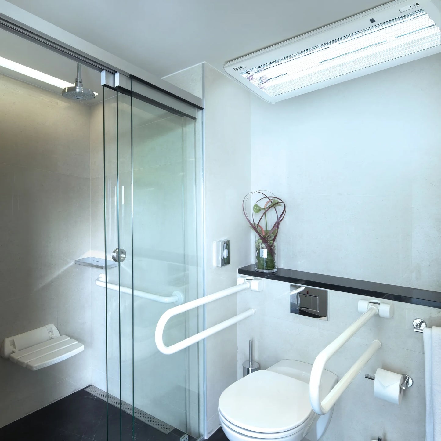 ASEPT 1X MAX UV sanitizer installed in an accessible patient bathroom to provide automatic disinfection.