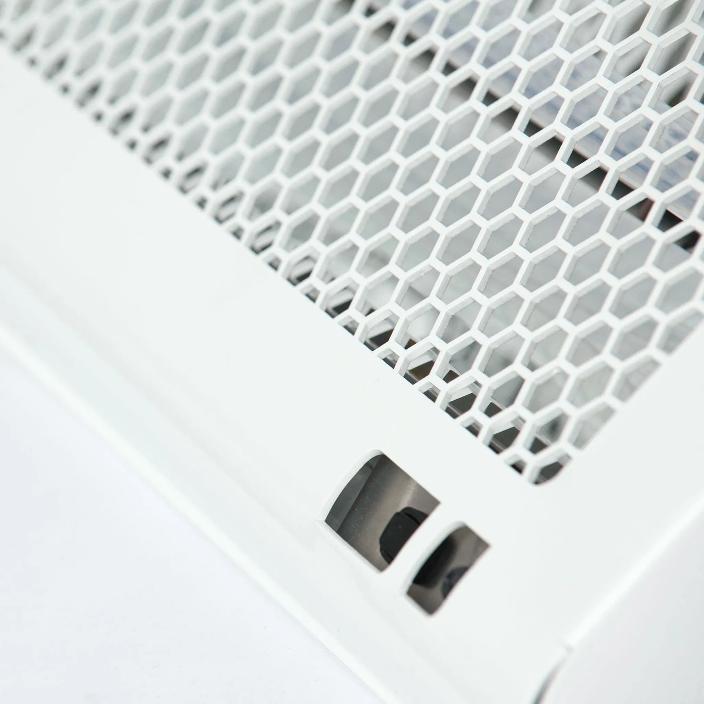 Close-up of the PrescientX ASEPT 1X MAX showing the integrated motion safety sensor below the white honeycomb grille.