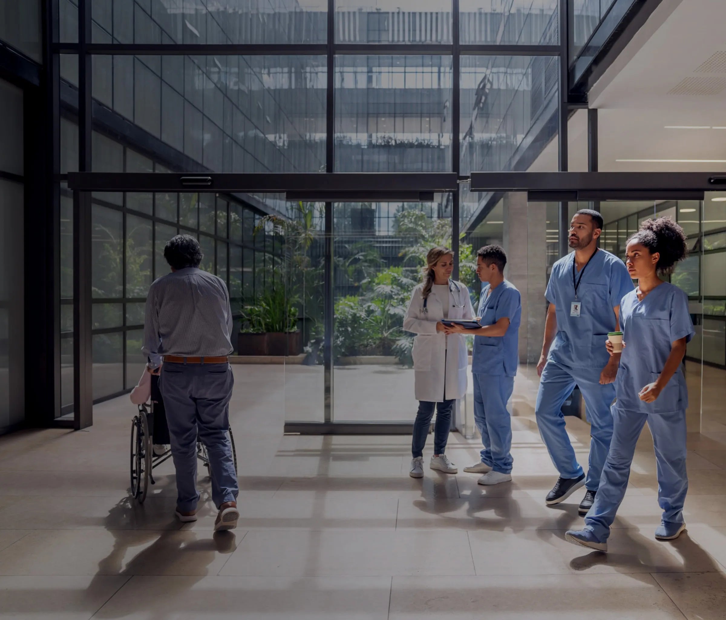 Healthcare professionals walking through a modern Canadian hospital, symbolizing teamwork and CSA-compliant infection prevention solutions by Prescientx.