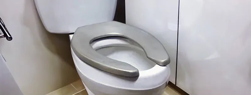Aereus antimicrobial toilet seat designed for continuous surface disinfection.