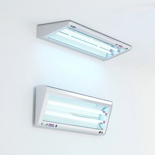 The PrescientX ASEPT 1X MAX UV sanitizer shown in both its ceiling and wall-mounted forms to illustrate a corner installation.